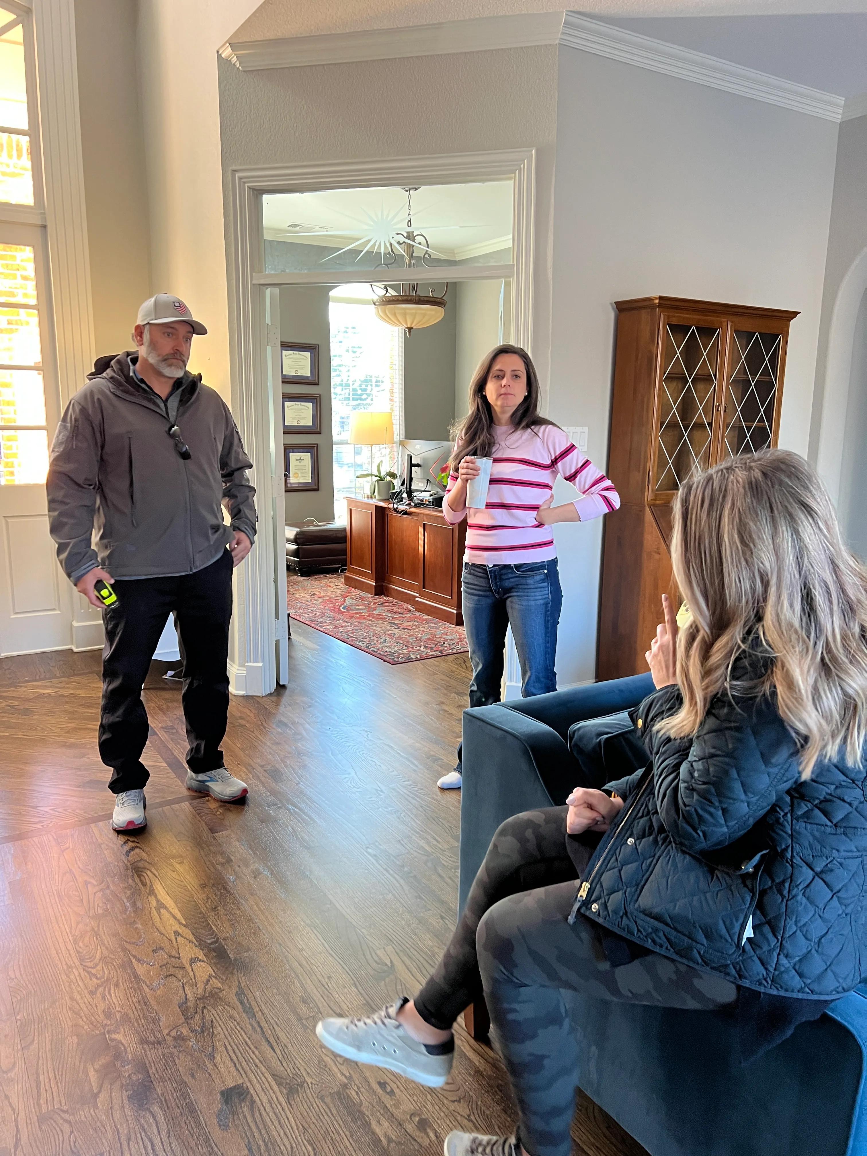 Chad walking a Southlake entryway with a homeowner and her interior designer.